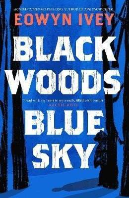 Black woods, blue sky