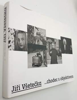 chodec s objektivem