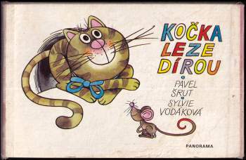 Kočka leze dírou