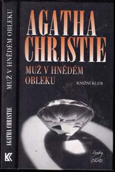 Muž v hnědém obleku