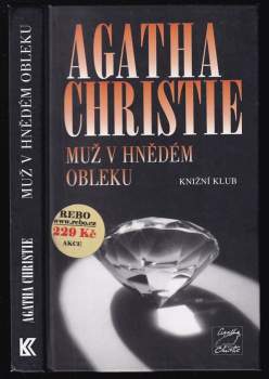 Muž v hnědém obleku