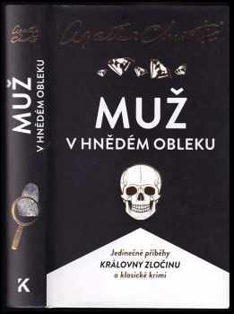 Muž v hnědém obleku