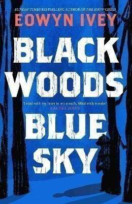 Black woods, blue sky